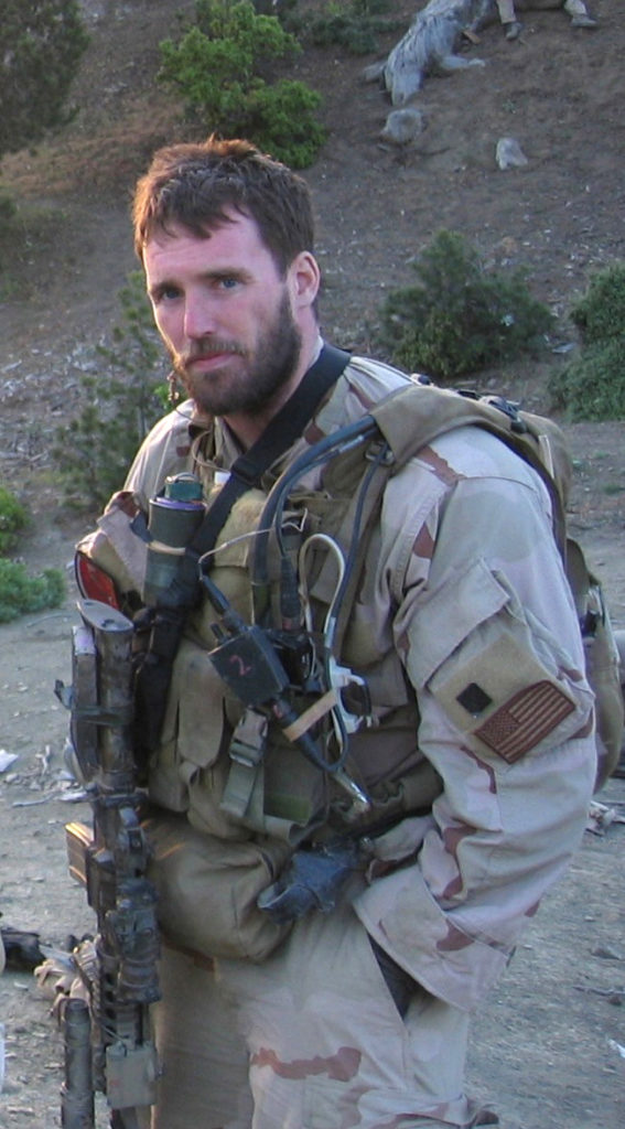 050628-N-0000X-002 Navy file photo of SEAL Lt. Michael P. Murphy, from Patchogue, N.Y. Murphy was killed by enemy forces during a reconnaissance mission, Operation Red Wing, June 28, 2005, while leading a four-man team tasked with finding a key Taliban leader in the mountainous terrain near Asadabad, Afghanistan. The team came under fire from a much larger enemy force with superior tactical position. Murphy knowingly left his position of cover to get a clear signal in order to communicate with his headquarters and was mortally wounded while exposing himself to enemy fire. While being shot and shot at, Murphy provided his units location and requested immediate support for his element. He returned to his cover position to continue the fight until finally succumbing to his wounds. U.S. Navy photo (RELEASED)